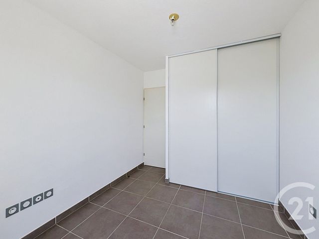 Appartement F3 à vendre - 3 pièces - 57.11 m2 - JUVIGNAC - 34 - LANGUEDOC-ROUSSILLON - Century 21 Vicarello