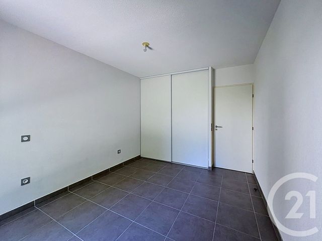 Appartement F3 à vendre - 3 pièces - 57.11 m2 - JUVIGNAC - 34 - LANGUEDOC-ROUSSILLON - Century 21 Vicarello