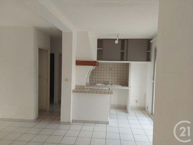 Appartement F3 à louer - 3 pièces - 52.65 m2 - MAUGUIO CARNON - 34 - LANGUEDOC-ROUSSILLON - Century 21 Vicarello