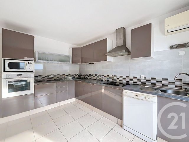 maison à vendre - 10 pièces - 210.0 m2 - MAUGUIO CARNON - 34 - LANGUEDOC-ROUSSILLON - Century 21 Vicarello